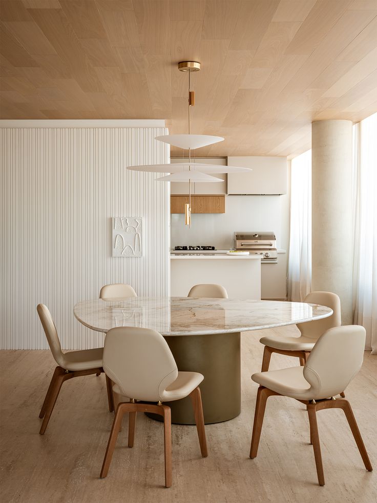 Bàn ăn làm từ đá marble trắng