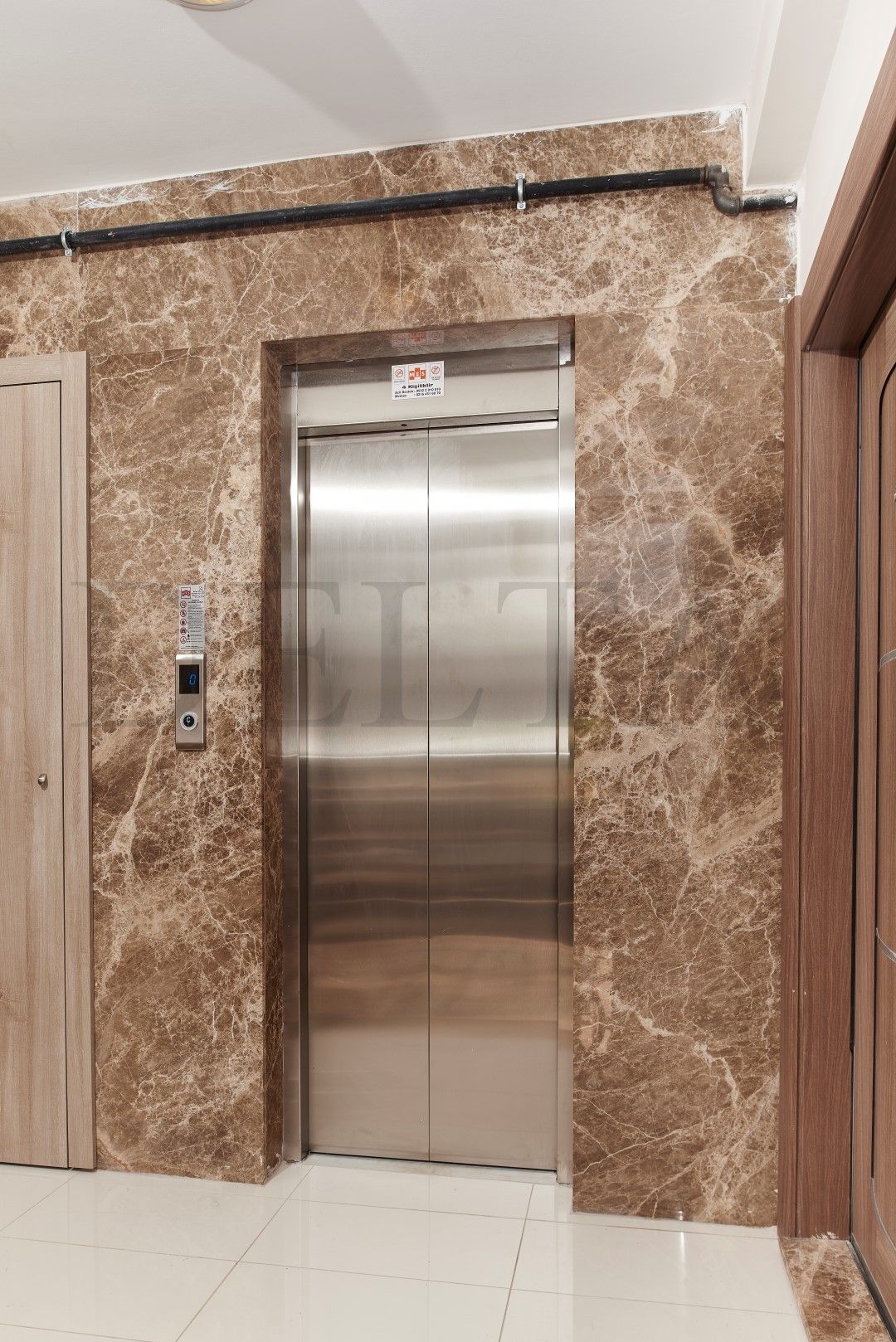 Đá nung kết màu nâu ốp thang máy 8