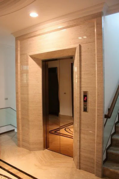 Đá nung kết vân travertine bóng ốp thang máy 3