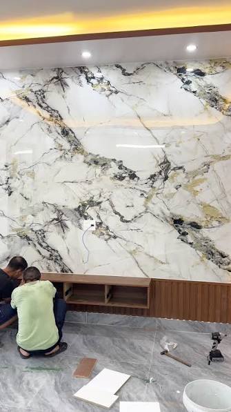 Thi công đá nung kết ốp vách tivi